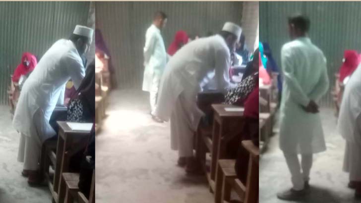 ময়মনসিংহে এসএসসি পরীক্ষার্থীর খাতায় লিখে দিচ্ছিলেন শিক্ষক, অতঃপর…