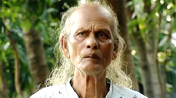 ২০ কোটি টাকা ক্ষতিপূরণ চাইলেন শাহ আবদুল করিমের পরিবার