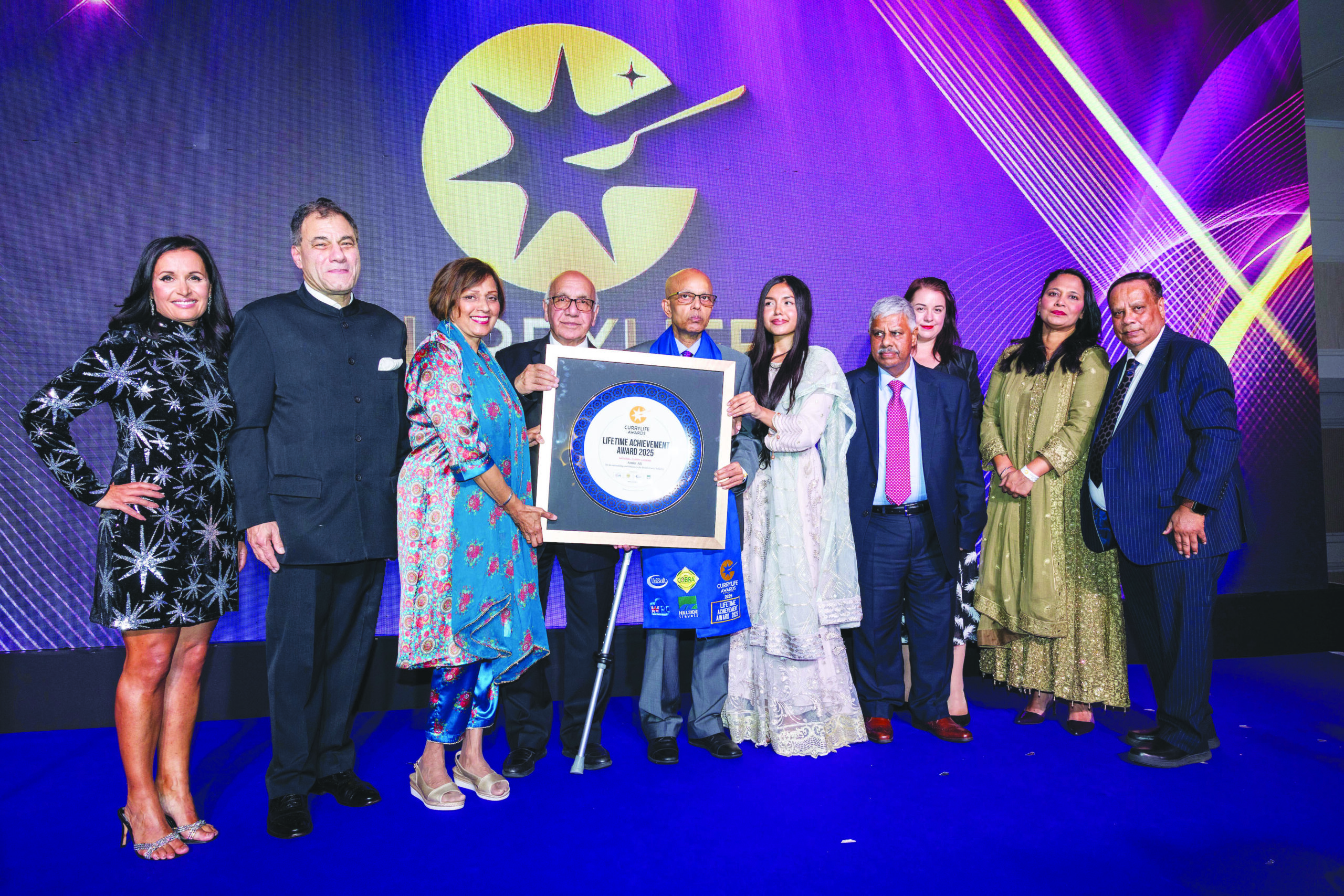 <span style='color:#333;font-size:18px;'>লন্ডনে ঝাঁকালো আয়োজনে রেস্তোরাঁ খাতের সাফল্য উদযাপন</span><br> কারি কিংবদন্তী আমিন আলীকে বিশেষ সম্মাননা